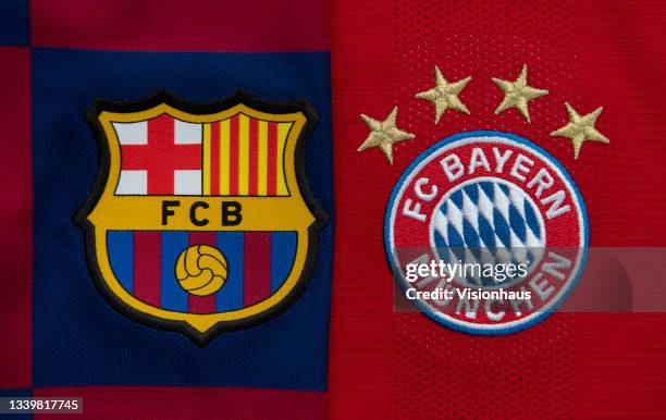 The FC Barcelona and FC Bayern Munich club badges on their first team home shirts ahead of their UEFA Champions League Group E match at the Camp Nou,...