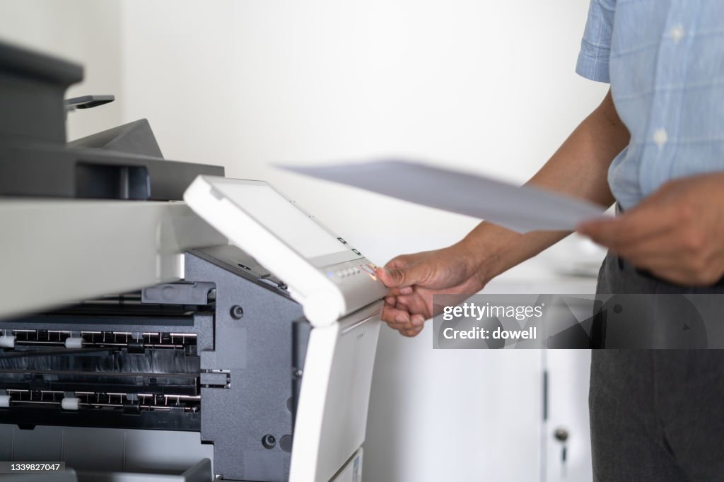 Business man working with printer