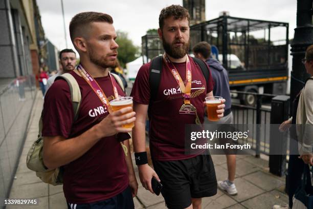 Two friends have a beer after they complete the 40th Great North Run on September 12, 2021 in Newcastle upon Tyne, England. Approximately 57,000...