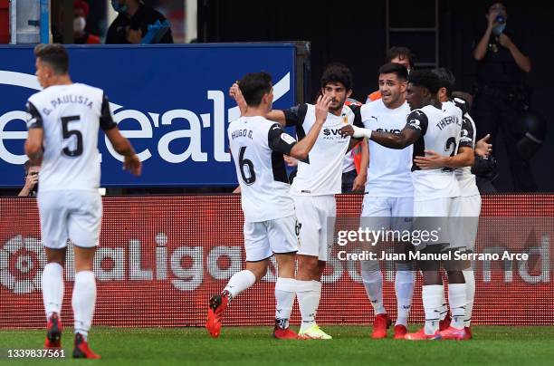 Maxi Gomez of Valencia CF celebrates after scoring goal during the LaLiga Santander match between CA Osasuna and Valencia CF at Estadio El Sadar on...