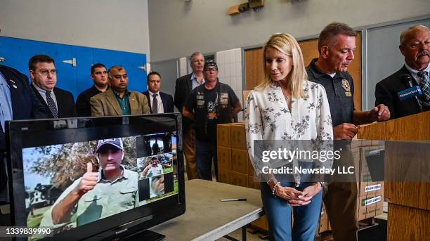 On September 9 Louisiana congressman Garret Graves is seen via video giving a thumbs up to Nassau County, New York, legislators Laura Schaefer, Steve...