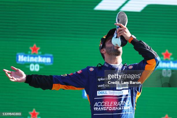Race winner Daniel Ricciardo of Australia and McLaren F1 celebrates on the podium during the F1 Grand Prix of Italy at Autodromo di Monza on...