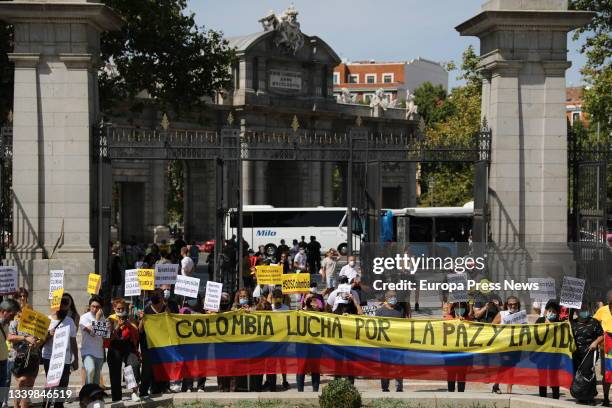 Several people take part in a demonstration against the arrival of the Colombian president to Madrid, at Puerta de Alcala, on September 12 in Madrid,...