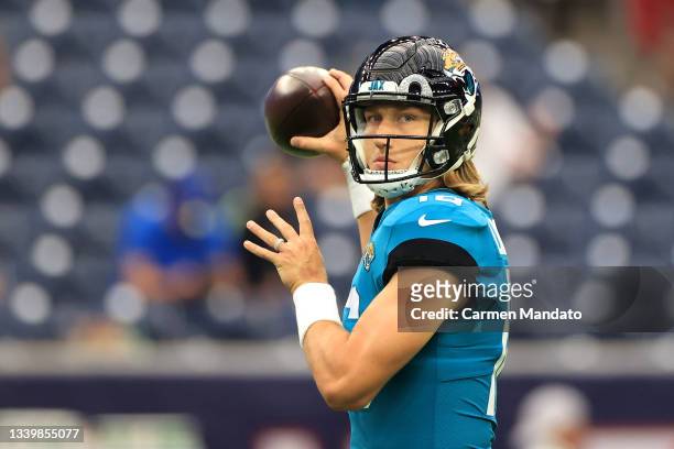 Trevor Lawrence of the Jacksonville Jaguars warms up prior to the game against the Houston Texans at NRG Stadium on September 12, 2021 in Houston,...