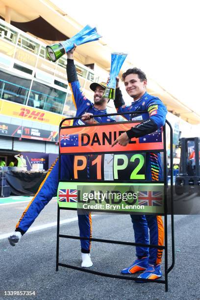 Race winner Daniel Ricciardo of Australia and McLaren F1 and second placed Lando Norris of Great Britain and McLaren F1 celebrate with their team...