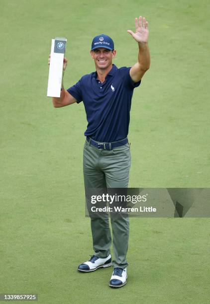 Billy Horschel of The USA with the trophy after winning The BMW PGA Championship at Wentworth Golf Club on September 12, 2021 in Virginia Water,...