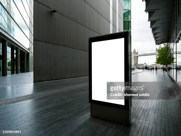 blank digital billboard on a modern london street - digital display ad stock pictures, royalty-free photos & images