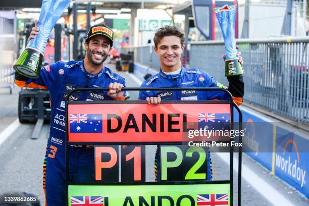 Daniel Ricciardo of Australia and McLaren and Lando Norris of McLaren and Great Britain celebrate finishing 1-2 during the F1 Grand Prix of Italy at...