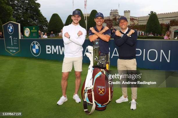 Billy Horschel of the United States of America pictured with West Ham United players Declan Rice and Mark Noble during Day Four of The BMW PGA...