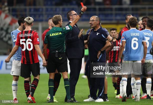 Referee Daniele Chiffi shows the yellow red card to SS Lazio coach Maurizio Sarri at the end of the Serie A match between AC Milan and SS Lazio at...