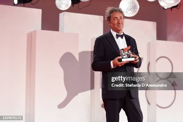 Director Paolo Sorrentino receives the Silver Lion Grand Jury Prize for "The Hand Of God" during the closing ceremony during the 78th Venice...