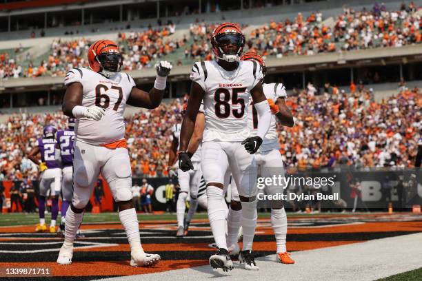 Tee Higgins of the Cincinnati Bengals celebrates after catching a 2-yard touchdown pass from Joe Burrow during the second quarter against the...