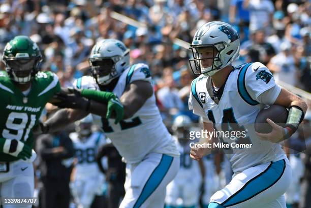 Sam Darnold of the Carolina Panthers runs for a five-yard touchdown during the second quarter against the New York Jets at Bank of America Stadium on...