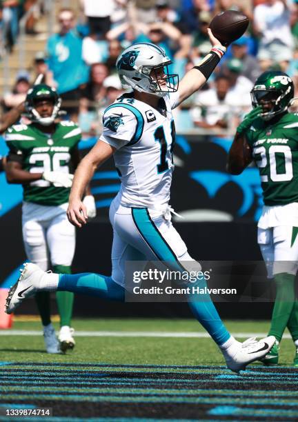 Sam Darnold of the Carolina Panthers runs for a five-yard touchdown during the second quarter against the New York Jets at Bank of America Stadium on...