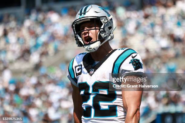 Christian McCaffrey of the Carolina Panthers reacts after a teammates' touchdown reception against the New York Jets during the second quarter at...