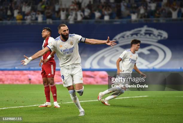 Karim Benzema of Real Madrid celebrates after scoring their team's first goal during the La Liga Santander match between Real Madrid CF and RC Celta...