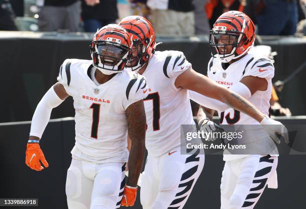 Ja'Marr Chase of the Cincinnati Bengals celebrates after a 50-yard touchdown reception from Joe Burrow during the second quarter against the...