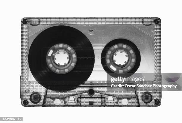 front view of a cassette audio tape on white background - cassette audio stock pictures, royalty-free photos & images