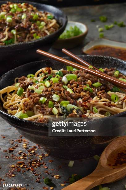 dan dan noodles - bowl of ramen stock pictures, royalty-free photos & images