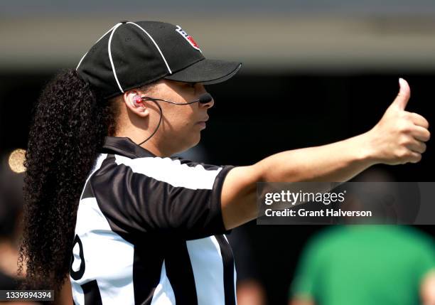 Line judge Maia Chaka signals during the game between the Carolina Panthers and the New York Jets at Bank of America Stadium on September 12, 2021 in...