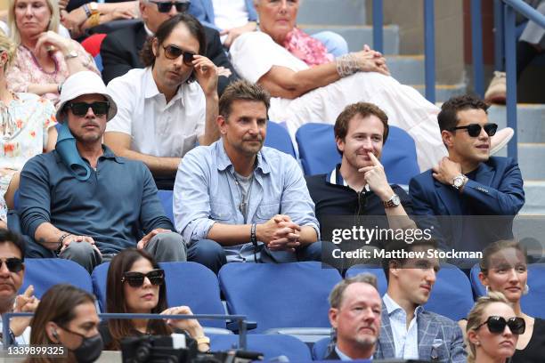 Actors Brad Pitt, Bradley Cooper, Joseph Mazzello and Rami Malek watch the Men's Singles final match between Daniil Medvedev of Russia and Novak...