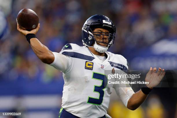 Russell Wilson of the Seattle Seahawks throws a pass against the Indianapolis Colts during the second half at Lucas Oil Stadium on September 12, 2021...