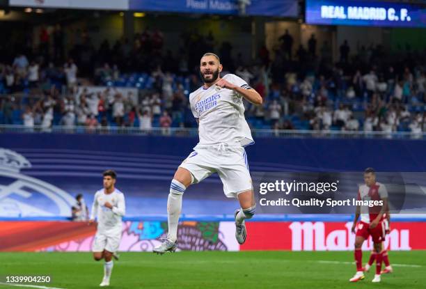 Karim Benzema of Real Madrid CF celebrates after scoring his team's fifth goal during the La Liga Santander match between Real Madrid CF and RC Celta...