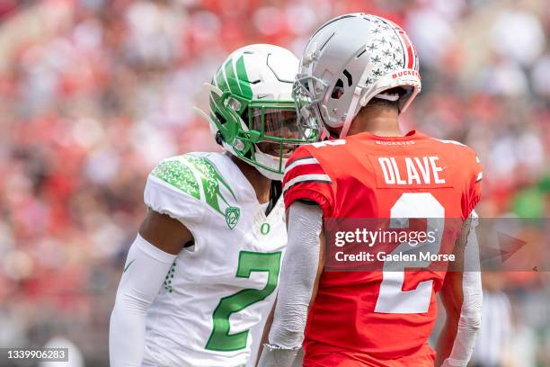 Cornerback Mykael Wright of the Oregon Ducks gets in the face of wide receiver Chris Olave of the Ohio State Buckeyes during the first quarter at...