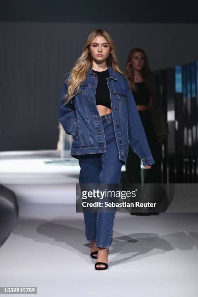 Leni Klum walks the runway at the Leni Klum X ABOUT YOU show during the ABOUT YOU Fashion Week Autumn/Winter 21 at Kraftwerk on September 12, 2021 in...