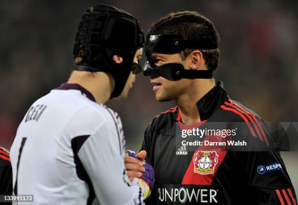 Michael Ballack of Leverkusen shakes hands with former Chelsea teammate goalkeeper Petr Cech prior to kickoff during the UEFA Champions League group...