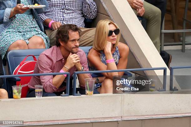 Actors Hugh Dancy and Claire Danes watch the Men's Singles final match between Daniil Medvedev of Russia and Novak Djokovic of Serbia on Day Fourteen...