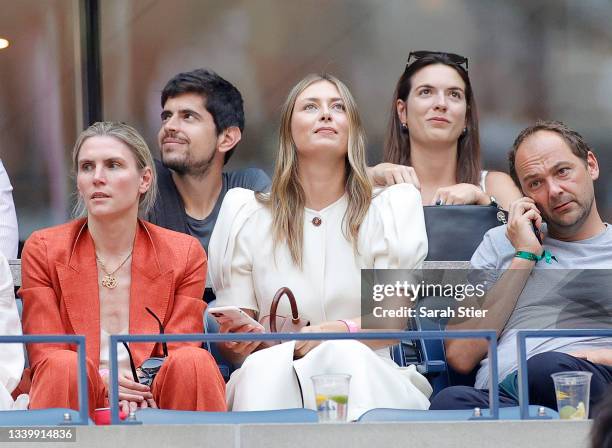 Maria Sharapova, tennis player, watches the Men's Singles final match between Daniil Medvedev of Russia and Novak Djokovic of Serbia on Day Fourteen...