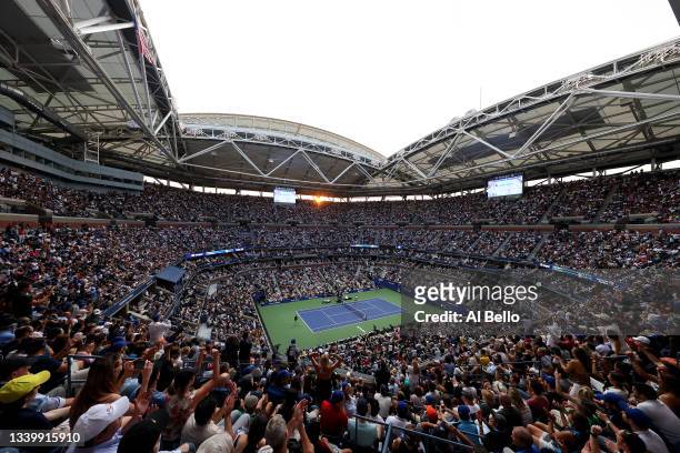Fans cheer as Daniil Medvedev of Russia takes on Novak Djokovic of Serbia during their Men's Singles final match on Day Fourteen of the 2021 US Open...