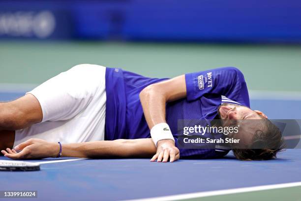 Daniil Medvedev of Russia celebrates winning championship point to defeat Novak Djokovic of Serbia during their Men's Singles final match on Day...