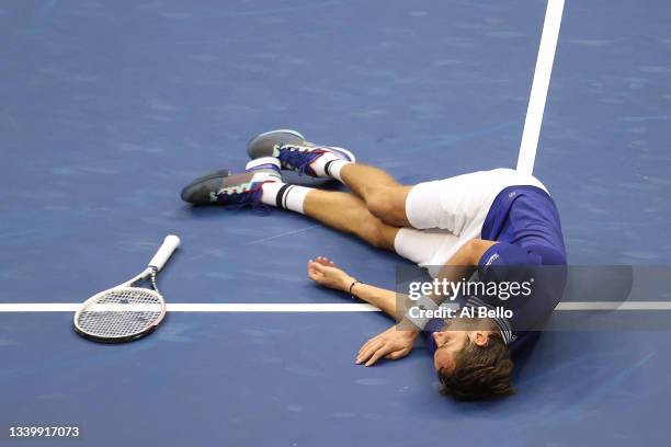 Daniil Medvedev of Russia celebrates winning championship point to defeat Novak Djokovic of Serbia during their Men's Singles final match on Day...