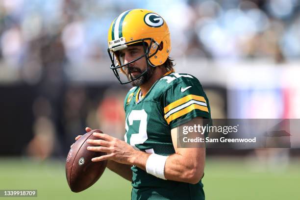 Aaron Rodgers of the Green Bay Packers warms up prior to the game against the New Orleans Saints at TIAA Bank Field on September 12, 2021 in...