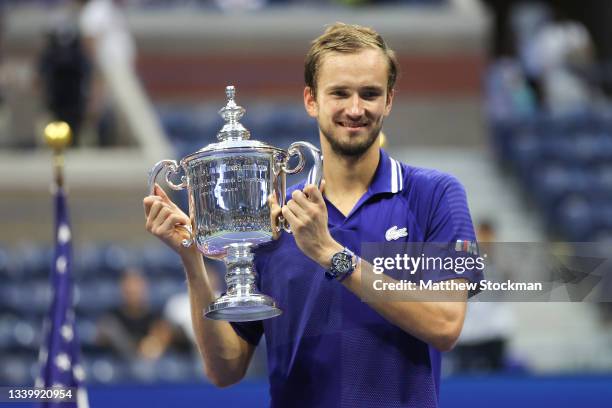 Daniil Medvedev of Russia celebrates with the championship trophy after defeating Novak Djokovic of Serbia to win the Men's Singles final match on...