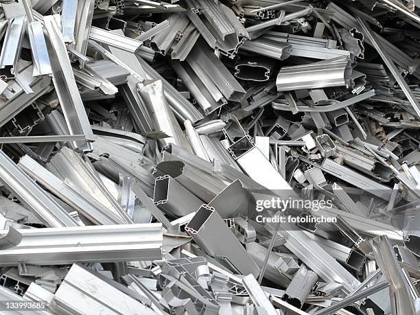 scrap metal pieces laying in a pile - als stock pictures, royalty-free photos & images