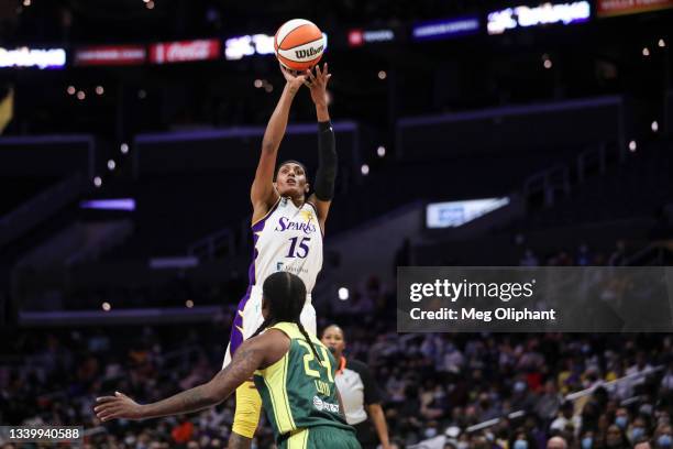 Guard Brittney Sykes of the Los Angeles Sparks shoots over guard Jewell Loyd of the Seattle Storm in the first half at Staples Center on September...