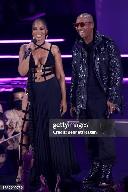 Ashanti and Ja Rule speak onstage during the 2021 MTV Video Music Awards at Barclays Center on September 12, 2021 in the Brooklyn borough of New York...