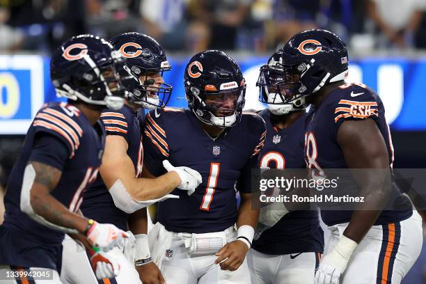 Justin Fields of the Chicago Bears celebrates a touchdown during the second half against the Los Angeles Rams at SoFi Stadium on September 12, 2021...