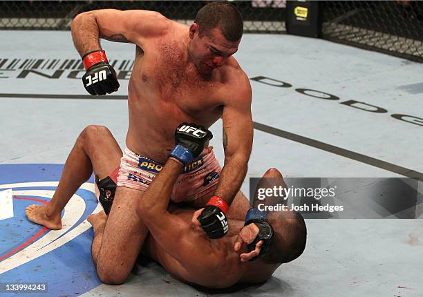 Mauricio "Shogun" Rua punches Dan Henderson during the UFC 139 event at the HP Pavilion on November 19, 2011 in San Jose, California.