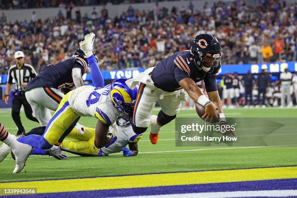 Justin Fields of the Chicago Bears dives for a touchdown during the second half against the Los Angeles Rams at SoFi Stadium on September 12, 2021 in...