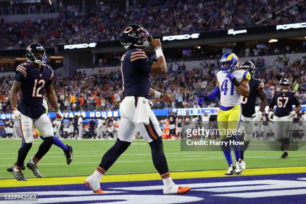Justin Fields of the Chicago Bears celebrates a touchdown during the second half against the Los Angeles Rams at SoFi Stadium on September 12, 2021...
