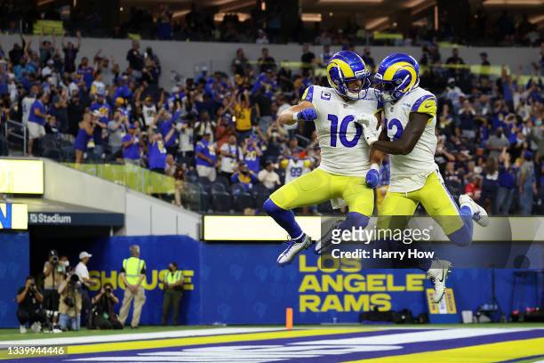 Cooper Kupp of the Los Angeles Rams celebrates a touchdown with Van Jefferson following a touchdown during the second half against the Chicago Bears...