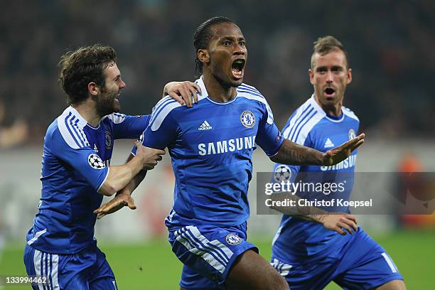 Didier Drogba celebrates the first goal with Juan Mata and Raul Meireles the UEFA Champions League group E match between Bayer 04 Leverkusen and...