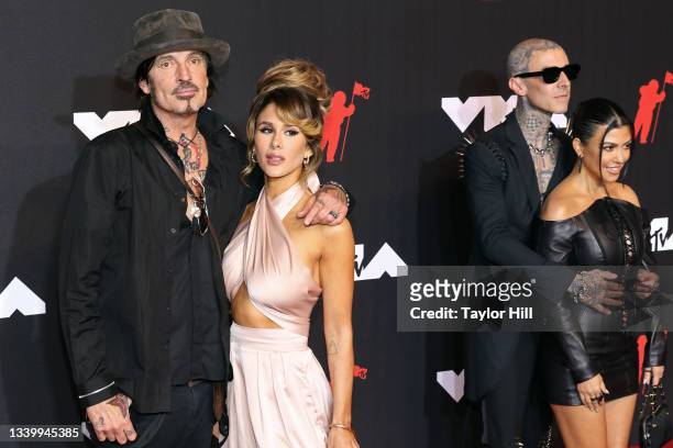 Tommy Lee, Brittany Furlan, Travis Barker, and Kourtney Kardashian attend the 2021 MTV Video Music Awards at Barclays Center on September 12, 2021 in...