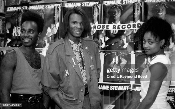Singer Jermaine Stewart and his dancers Andre Maclin and Indira Tyler poses for photos at Rose Records in Chicago, Illinois in 1986.