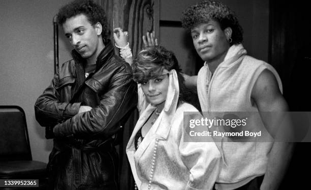 Singers and musicians Spanador , Lisa Lisa and Mike Hughes of Lisa Lisa & Cult Jam poses for photos backstage at the Vic Theatre in Chicago, Illinois...