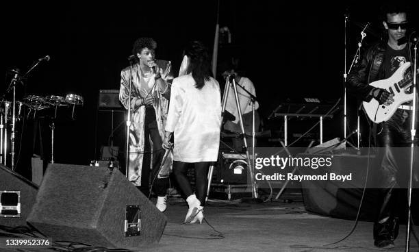 Singers and musicians Mike Hughes, Lisa Lisa and Spanador of Lisa Lisa & Cult Jam performs at the Vic Theatre in Chicago, Illinois in 1986.